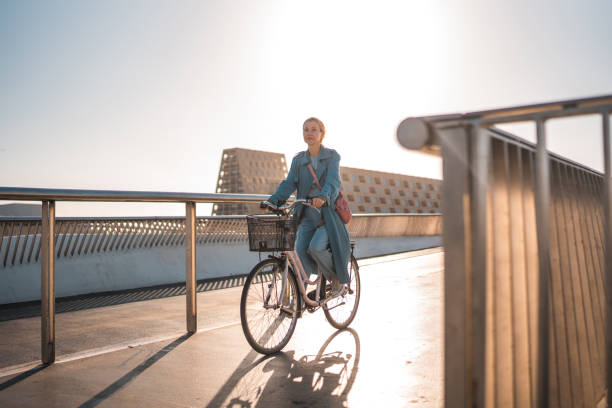 istock Beautiful Caucasian Female Discovers Copenhagen's Riverside Gems on Two Wheels 1499740029