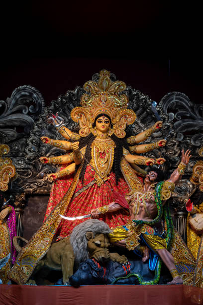 istock Goddess Durga devi idol decorated at puja pandal in Kolkata, West Bengal, India. Durga Puja is biggest religious festival of Hinduism and is now celebrated worldwide. 1499741090