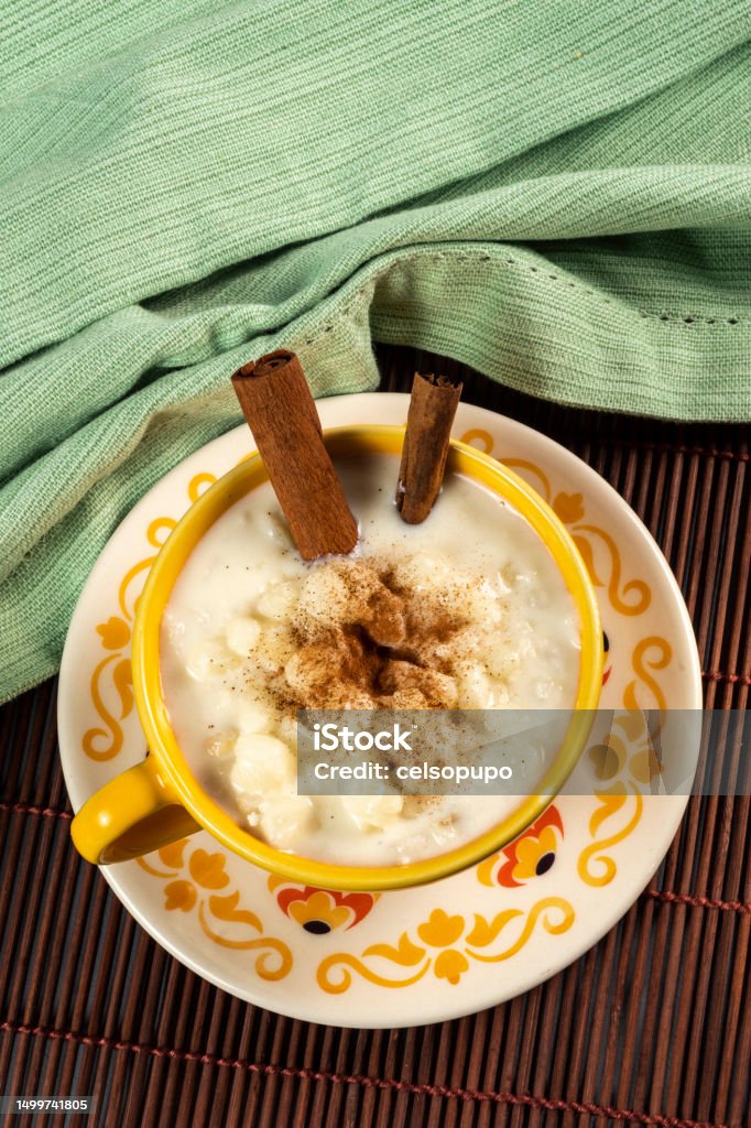 cup of canjica, typical food consumed in the Brazilian Festa Juninas cup of canjica, typical food consumed in the Brazilian Festa Juninas (june Party) Porridge Stock Photo