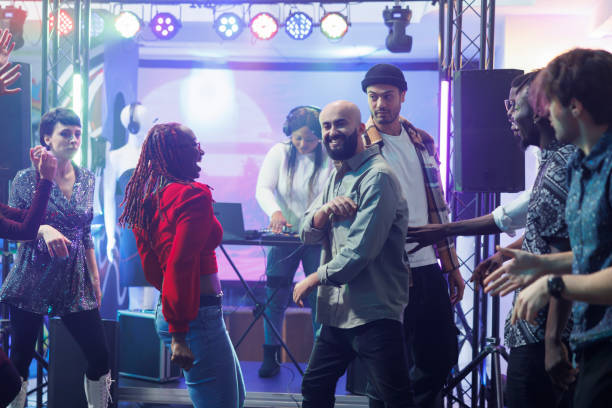 istock Couple laughing dancing at nightclub 1499741947
