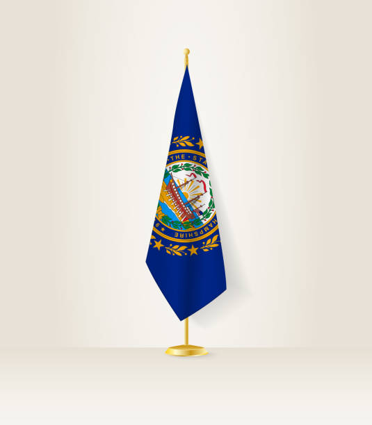 istock New Hampshire flag on a flag stand. 1499742535