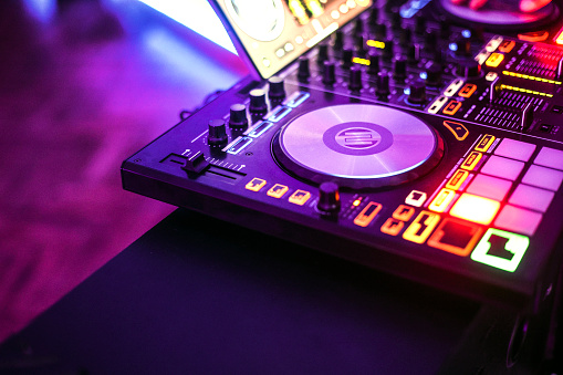 Clubbing and nightlife - turntable in a nightclub.
