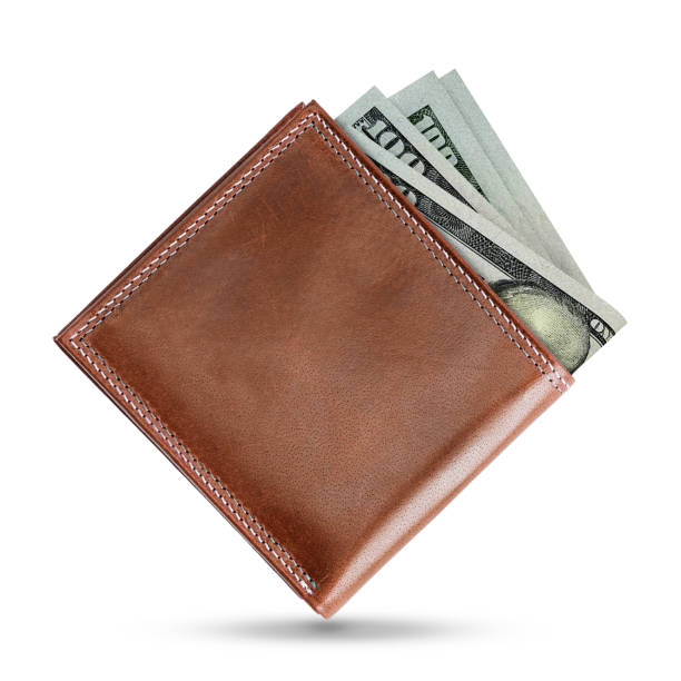 istock 3D rendering of US dollar notes in a brown leather men’s wallet. US dollars in wallet 1499749533