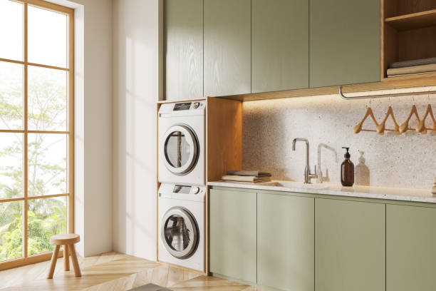 istock Cozy laundry interior with washing machines, shelves and panoramic window 1499749542