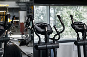 Modern gym interior with sports equipment: sport treadmill machine. New fitness center inventory for sport events and training exercises. Concept of sport design backgrounds. Copy text space, banner