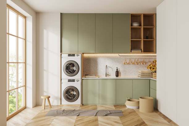 istock Modern laundry interior with shelves, washing machines and panoramic window 1499751118