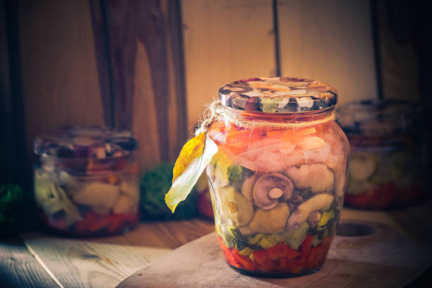 Autumn harvest mushrooms marinated vegetables jars