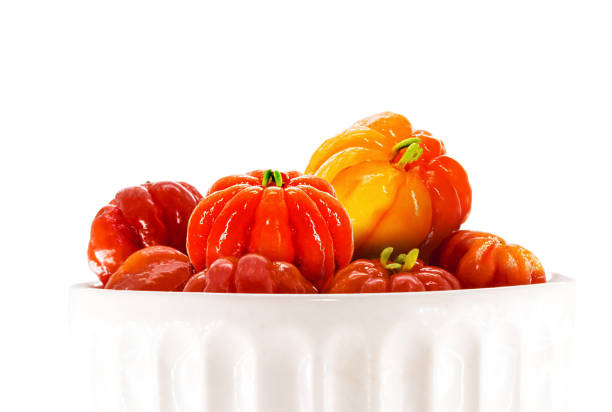 pitangas bowl isolated on white background, typical south american fruit, brazil cherry, white background and copyspace
