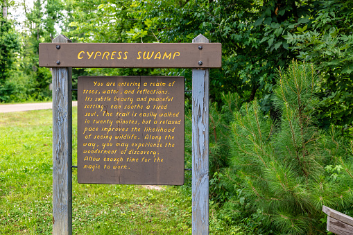 Natchez Trace Parkway, MS, USA. 7 June 2023. Sign for Cypress Swamp