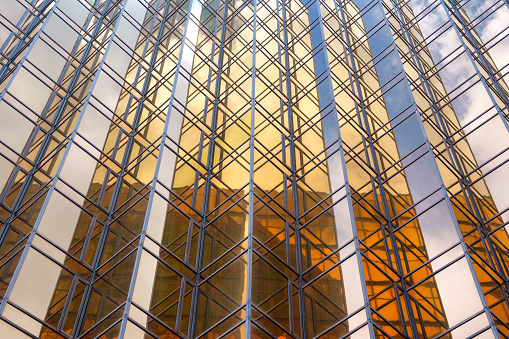 Abstract Background of golden glass building exterior design