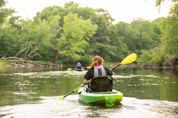 istock Two Girls & Dog Kayaking Down Rum River 1499758332