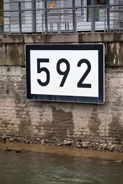 istock Number 592 on a riverbank wall 1499760456