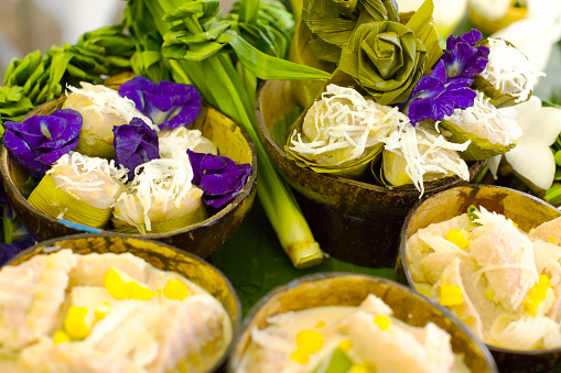 Close-up of  Coconut bowls with thai coconut banana jelly sweet dessert