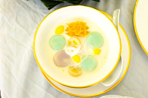 Sweet thai banana coconut jelly dessert in cream
