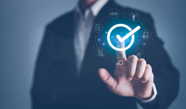 istock Quality management with Quality Assurance or QA and Quality Control or QC and improvement. Standardization, certification concept. Compliance to regulations and standards. Concept with manager. 1499762088