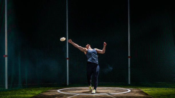istock Athlete woman throwing discus 1499763845