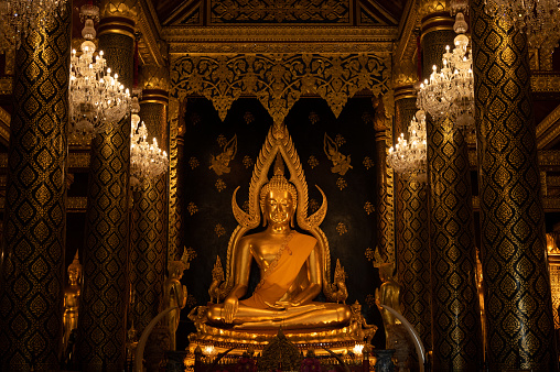 An iconic Buddha statue in Phtsanulok province, Thailand.