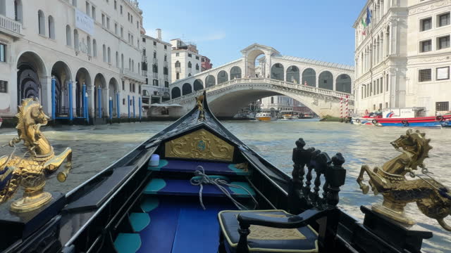 A Gondola ride across the canals of Venice, Italy