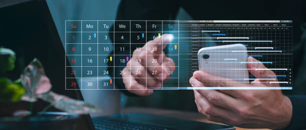 istock Organizing and carrying out, Businesspeople use laptop computers to manage projects and update tasks. Planning well while still working. 1499769633