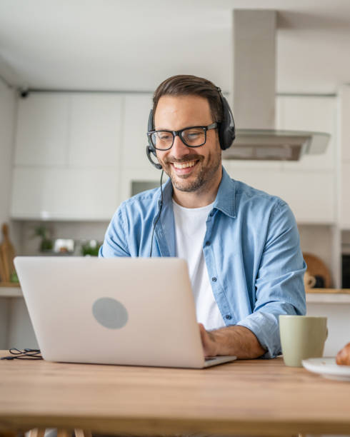 istock One man caucasian male freelancer work from home on laptop computer 1499770744