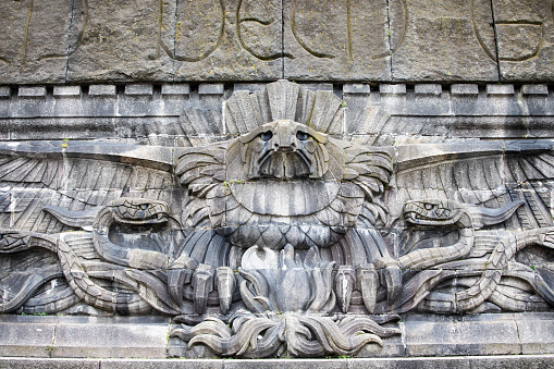 Berlin, Germany - January 6, 2015: German Eagle from the 1930s on the main building of the Tempelhof Airport in Berlin, Germany.