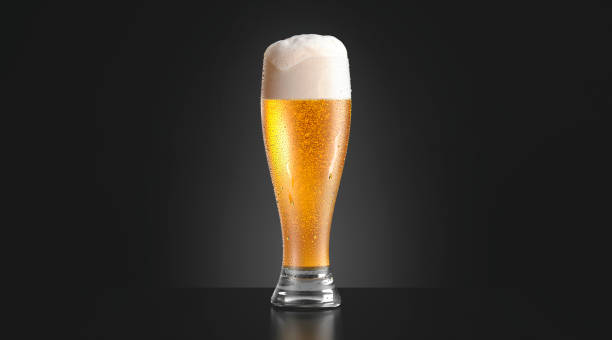 Blank transparent beer glass mockup, dark background stock photo