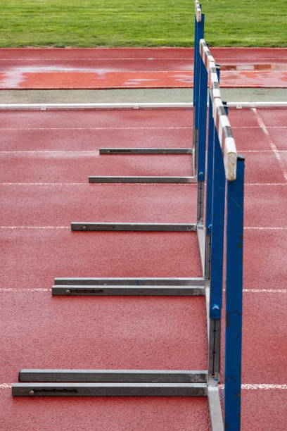 istock Synthetic running track for sporting events with hurdles 1499772203