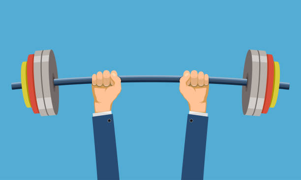 istock Hands of a businessman in a suit lifts a weight barbell 1499772490