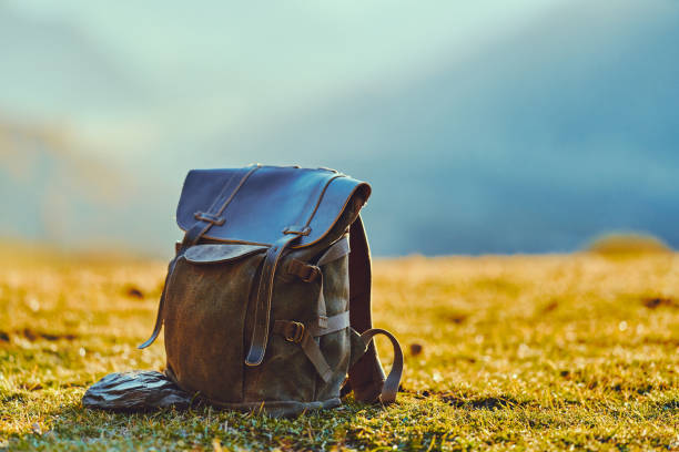 istock Travel backpack for exciting journey trip and nature discovery. Copy space 1499772632