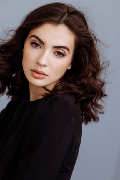 istock Young beautiful brunette in the studio 1499777148