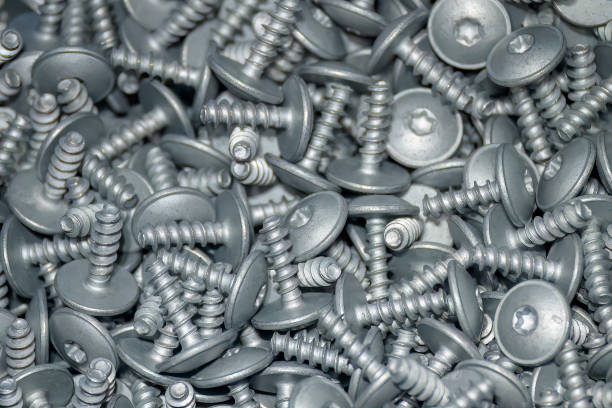 the pile of hexagon socket head screw in the container box. - screwdriver screw tighten fastener imagens e fotografias de stock