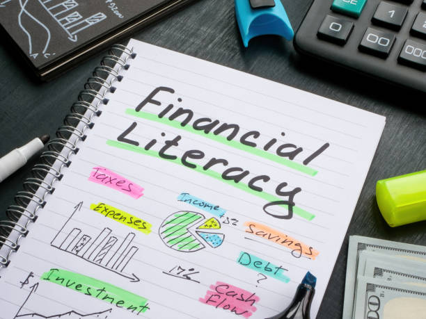 A Notebook with marks about financial literacy. stock photo