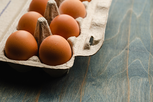Fresh eggs in paper tray