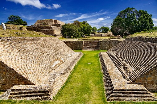 Monte Albán, is one of the earliest cities of Mesoamerica, important for nearly thousand years.  The Maya Ballgame (called Pok-A-Tok) was played with a rubber ball in an arena in the shape of an \