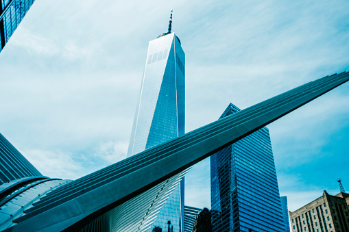 New York City, United States - May 19, 2023: Detail of the Oculus building, in the Financial District of New York City, and the One World Trade Center building in the background