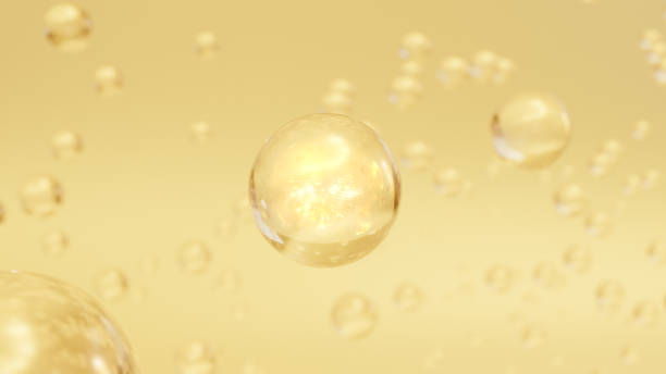 istock 3D cosmetic rendering Bubbles of Golden Serum on a blurred background 1499789277