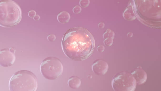 istock Serum bubbles in pink on a fuzzy background. 1499789281
