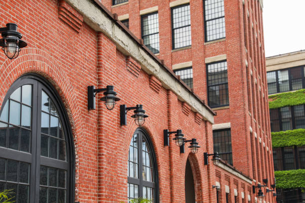 Brick buildings: icons of stability, progress, and community. Offices and apartment complexes symbolize growth, urban living, and shared aspirations