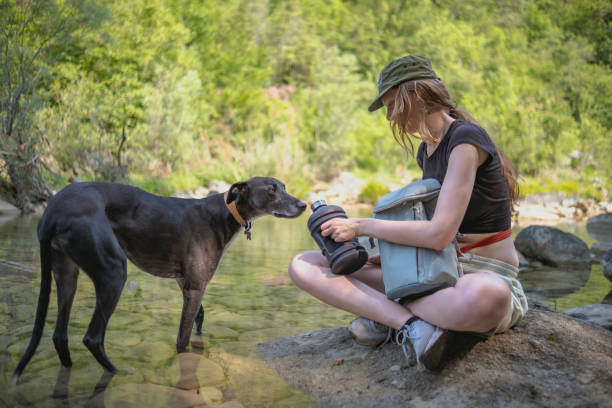 Me and my dog hiking by the river