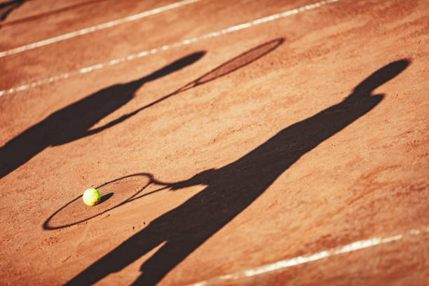 istock Shadow On A Tennis Court 1499798065