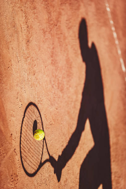 istock Shadow On A Tennis Court 1499798076