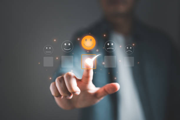 istock Male customer touching checkmark in checkbox review satisfaction survey on excellent smile face icon rating in service impressed, feedback for service providers to improve business 1499799360