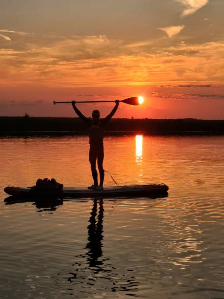 istock Silhouette of an athlete against the sunset 1499799748