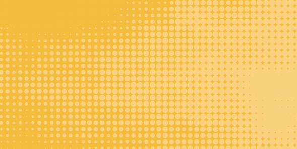 creative yellow halftone background in retro comic style with gradation of dots design, graphic illustration background. idea for background image or to add graphic texture to any designs.