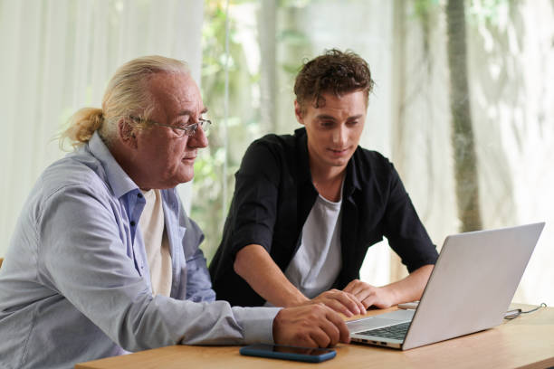 istock Senior Man Asking Grandson to Help 1499800074