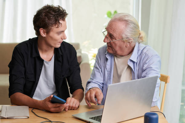 istock Young Man Visiting Grandfather 1499800078