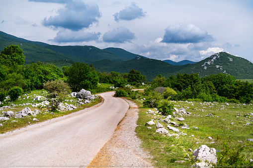 View over the hilly landscape of the Croatian Coastal Mountains in early summer.