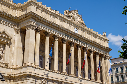 Paris : Hotel de Matignon entrance, with french flag. It's a State building of french administration, where the first minister (head of government\n) work, with all his team, senior official and official or public servant. Situated rue de Varenne in Paris, 7 th district – arrondissement – in France.