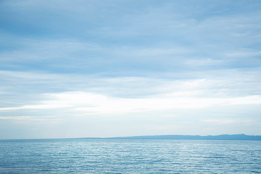 Blue sea, horizon and sky