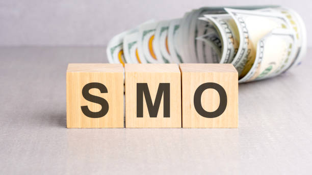 istock word SMO on wooden cubes, grey background 1499812943